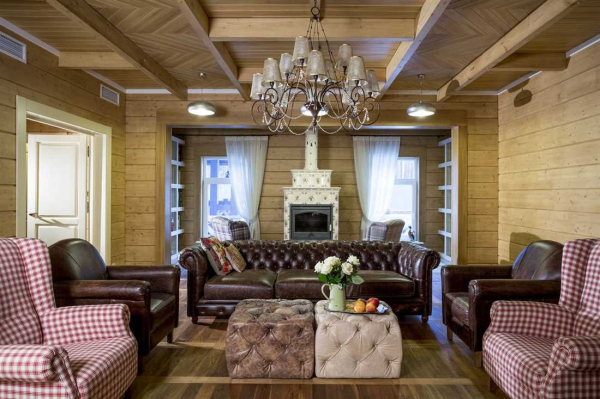 Правила создания уютного и стильного интерьера деревянного дома из бревна